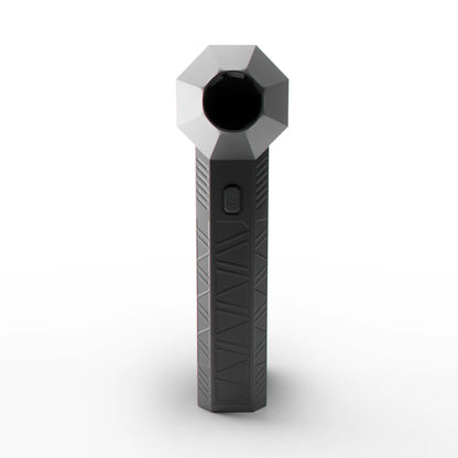 A handheld black blower with a geometric pattern on its body and a single button on the front.